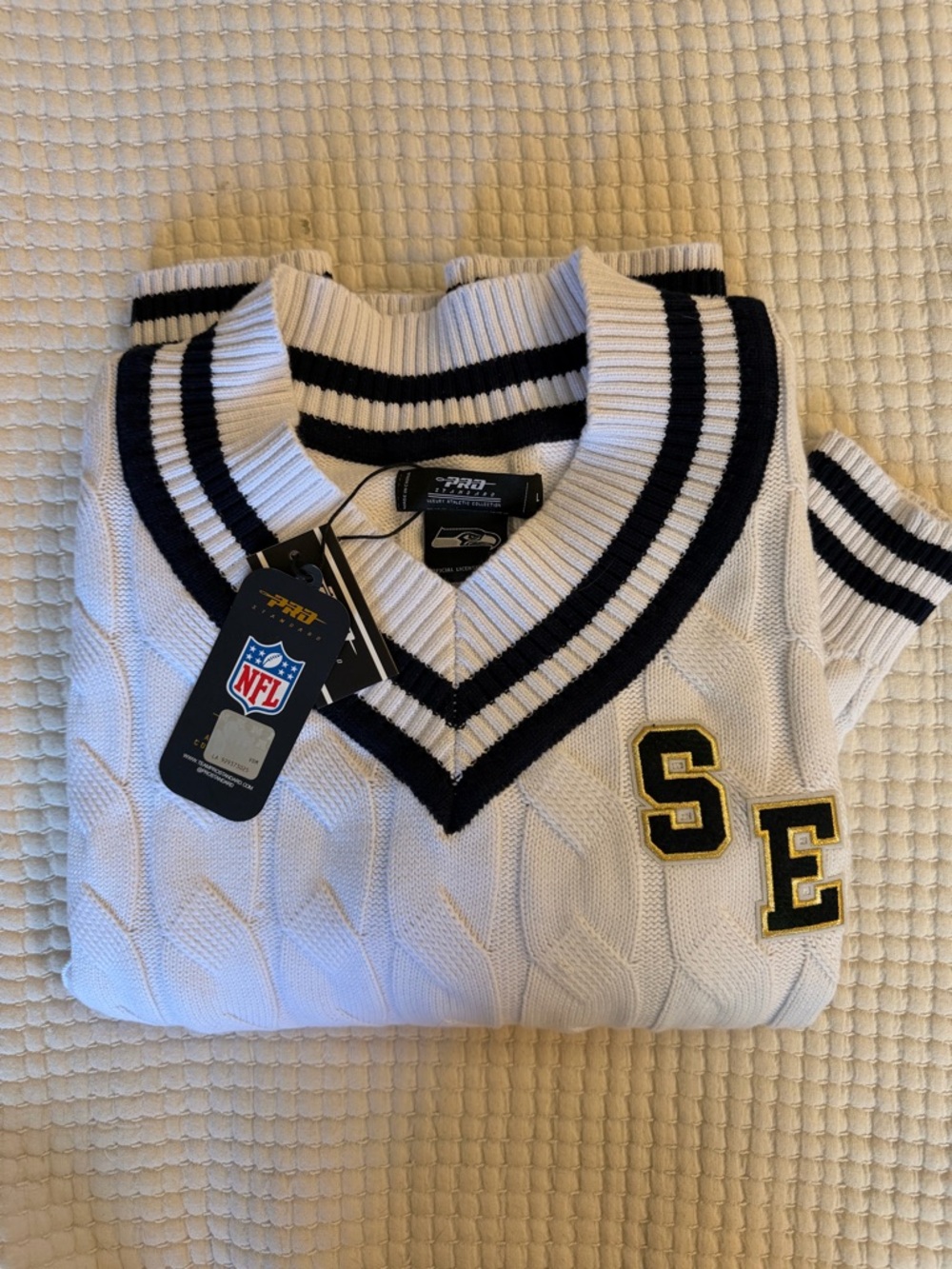NFL Seattle Seahawks Women’s White Cable Knit V-Neck Sweater with Navy Trim